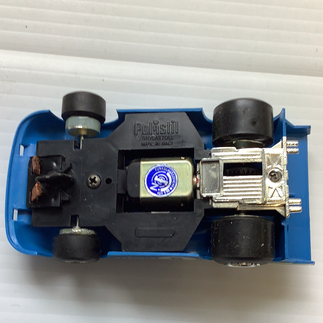 Blue toy car showing internal motor and wheels for Polistil Evolution A.105