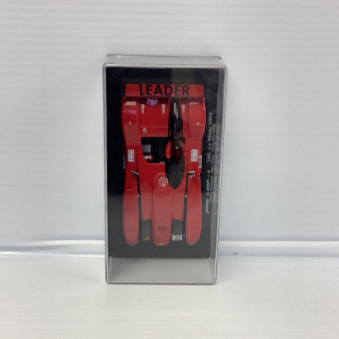 Red and black car model on a display card for Fly Car 88045