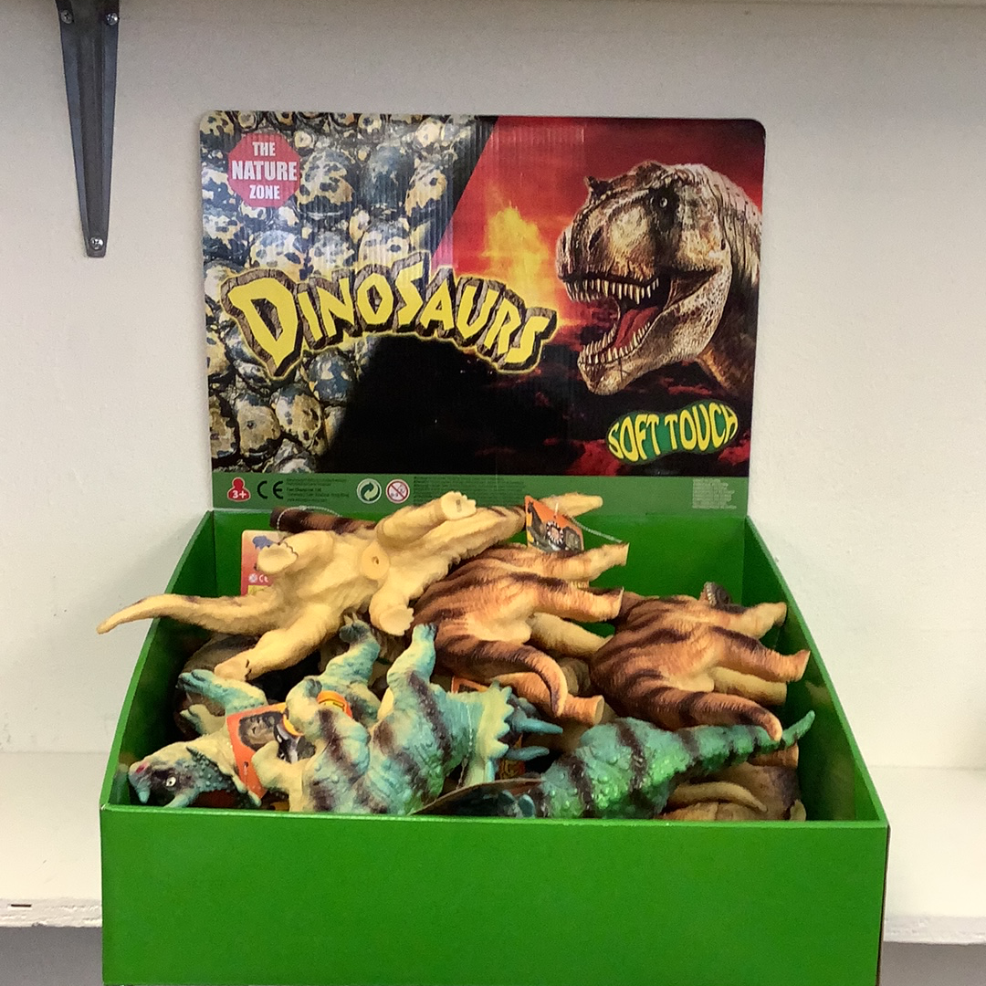 Assortment of soft, colorful dinosaur toys in a green display box for Schylling IMX49432