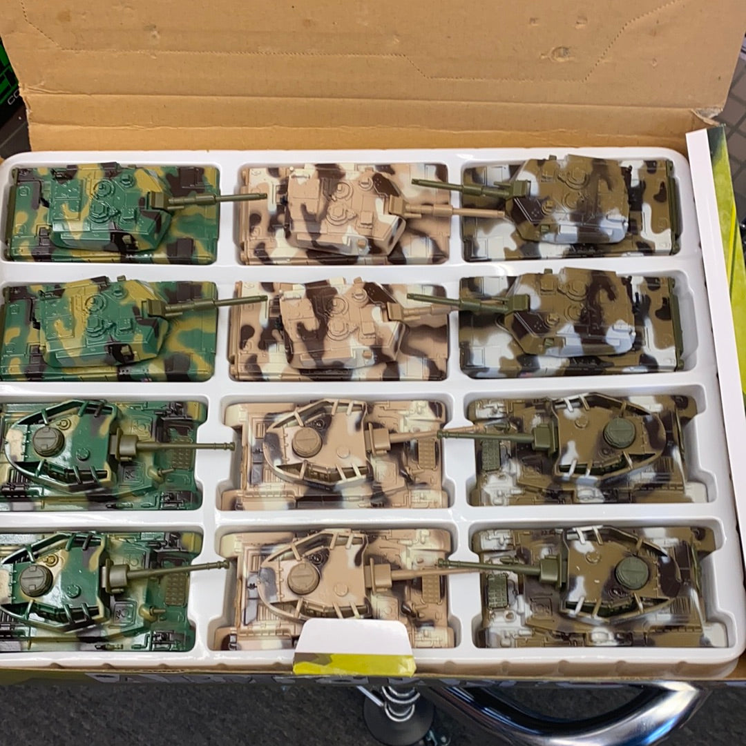 Assortment of toy tanks in various camouflage patterns displayed in a case for Toy Smith 2531