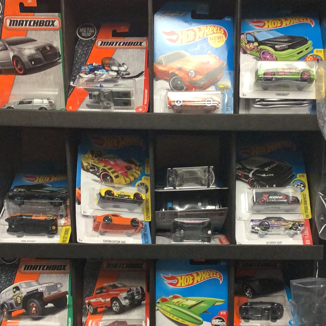 Assortment of die-cast toy cars and vehicles in various colors and styles for UPD 30782