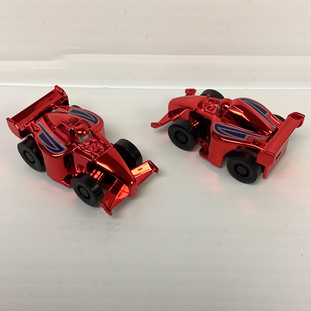 Two red, vintage-style race cars on a white surface for California Creations 20451, front view