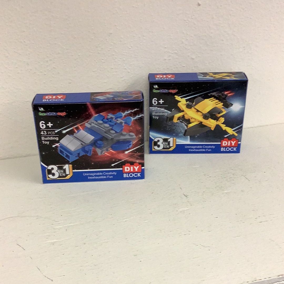 Two toy building sets: a blue spaceship and a yellow vehicle for DIYBlock 88388TY