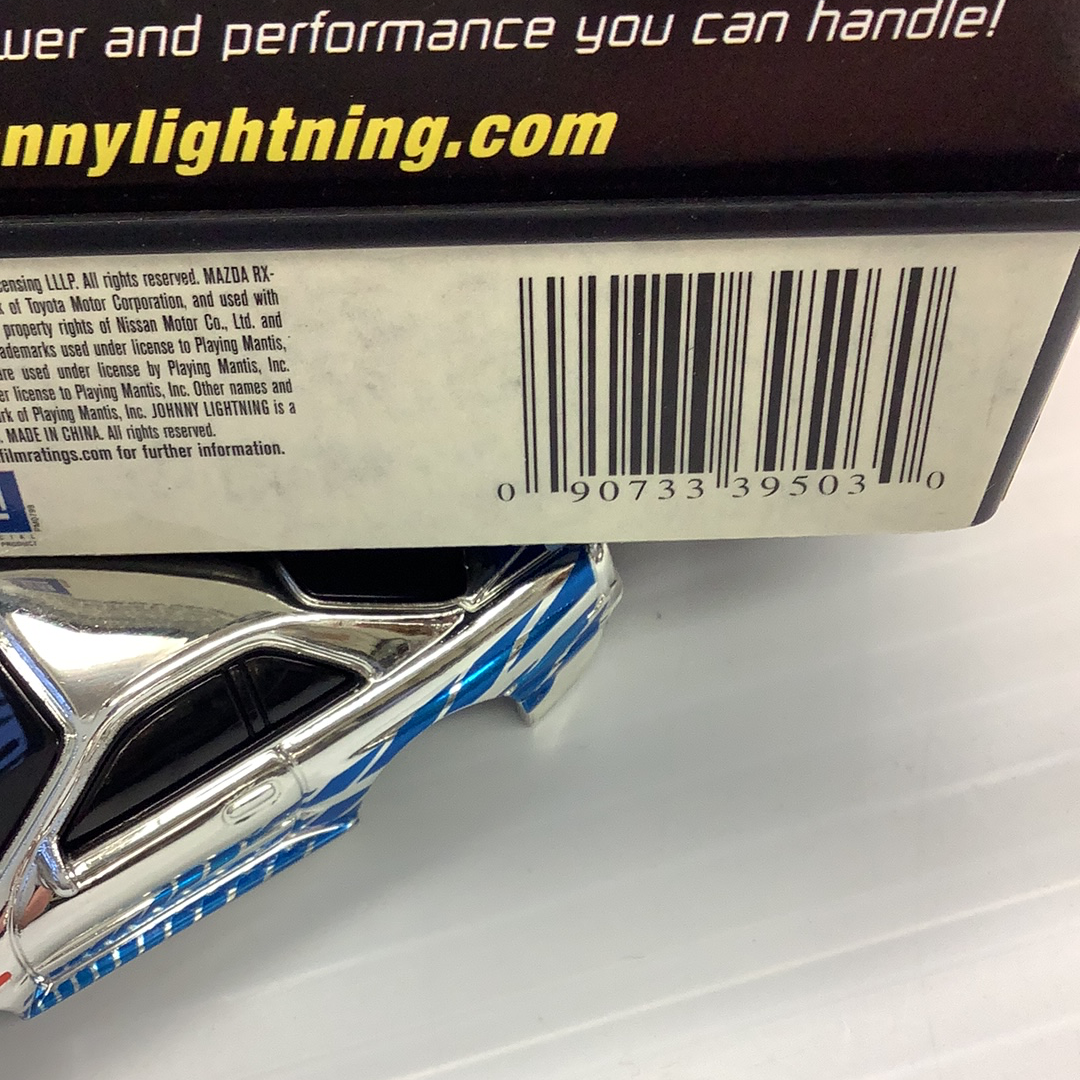 Slot car replica of a Nissan Skyline, silver and blue for Johnny Lightning 39503