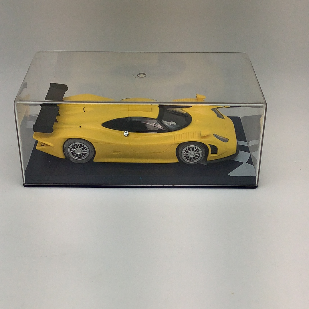 Yellow Porsche 911 GT1 98 racing model in a clear display case for Fly Car RG 0a, display case view, product view 5