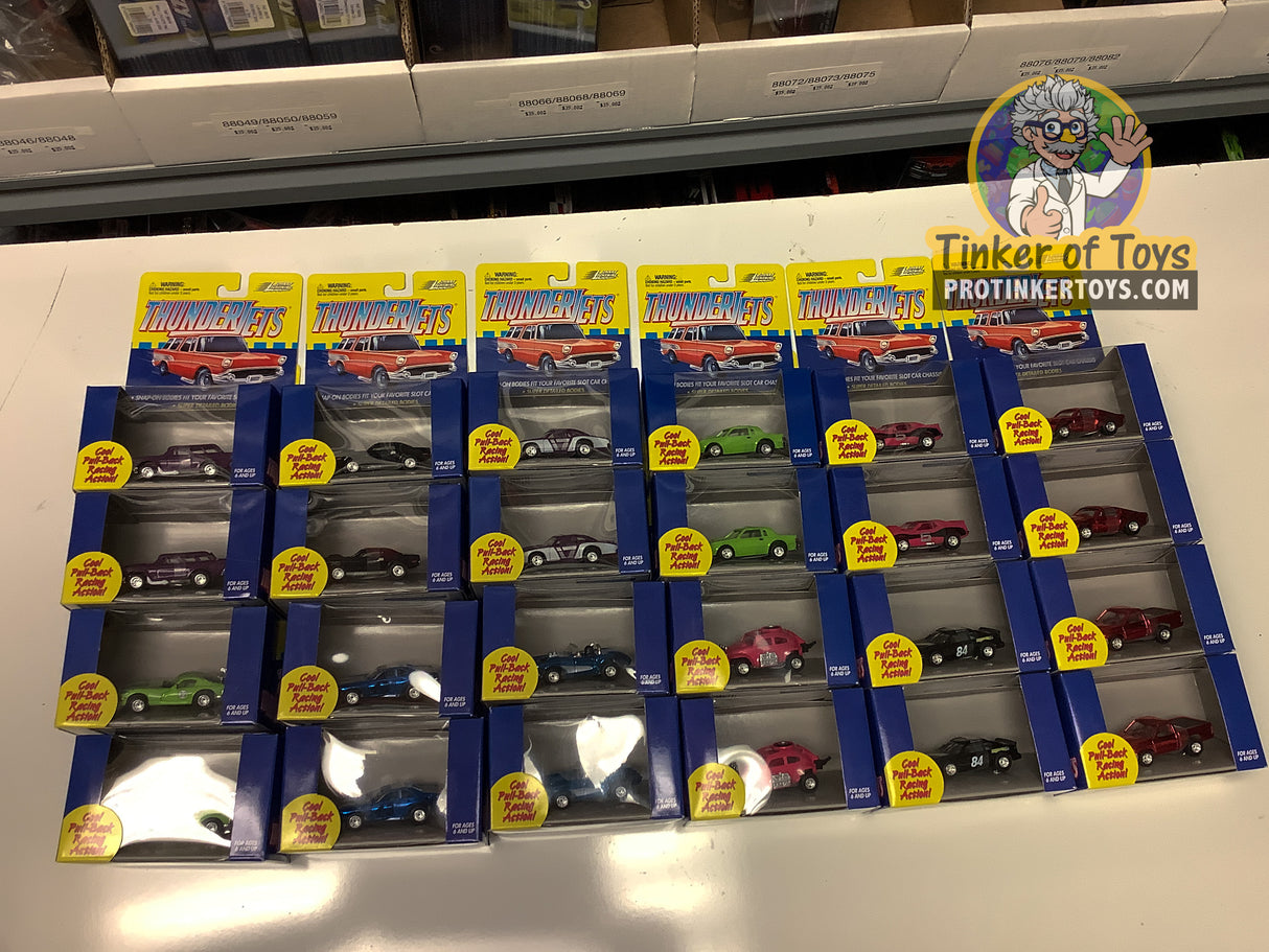 Assortment of pull-back toy vehicles in various colors and styles for Johnny Lightning 39302