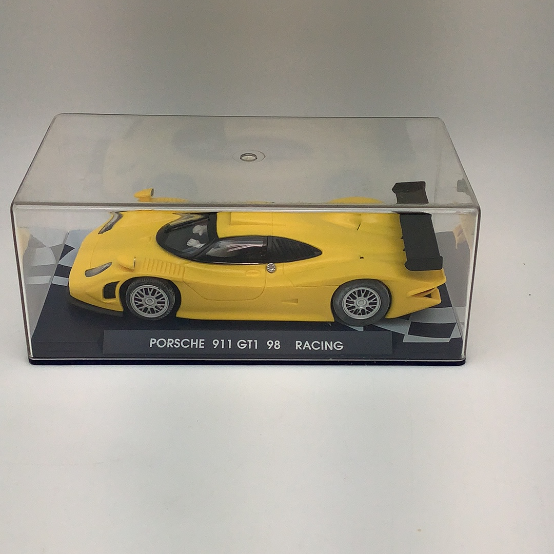 Yellow slot car of a Porsche 911 GT1 98 Racing for Fly Car RG 0a, front view