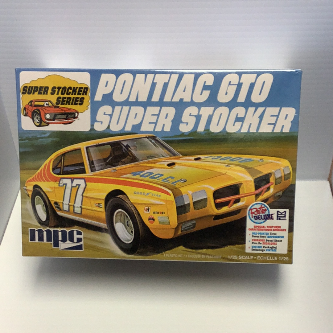 Yellow 1970 Pontiac GTO Super Stocker model kit box art for MPC MPC939