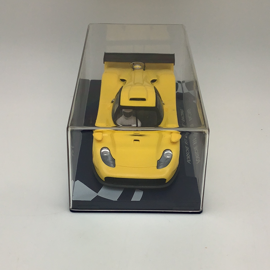 Yellow Porsche 911 GT1 98 racing model in a clear display case for Fly Car RG 0a, display case view, product view 4