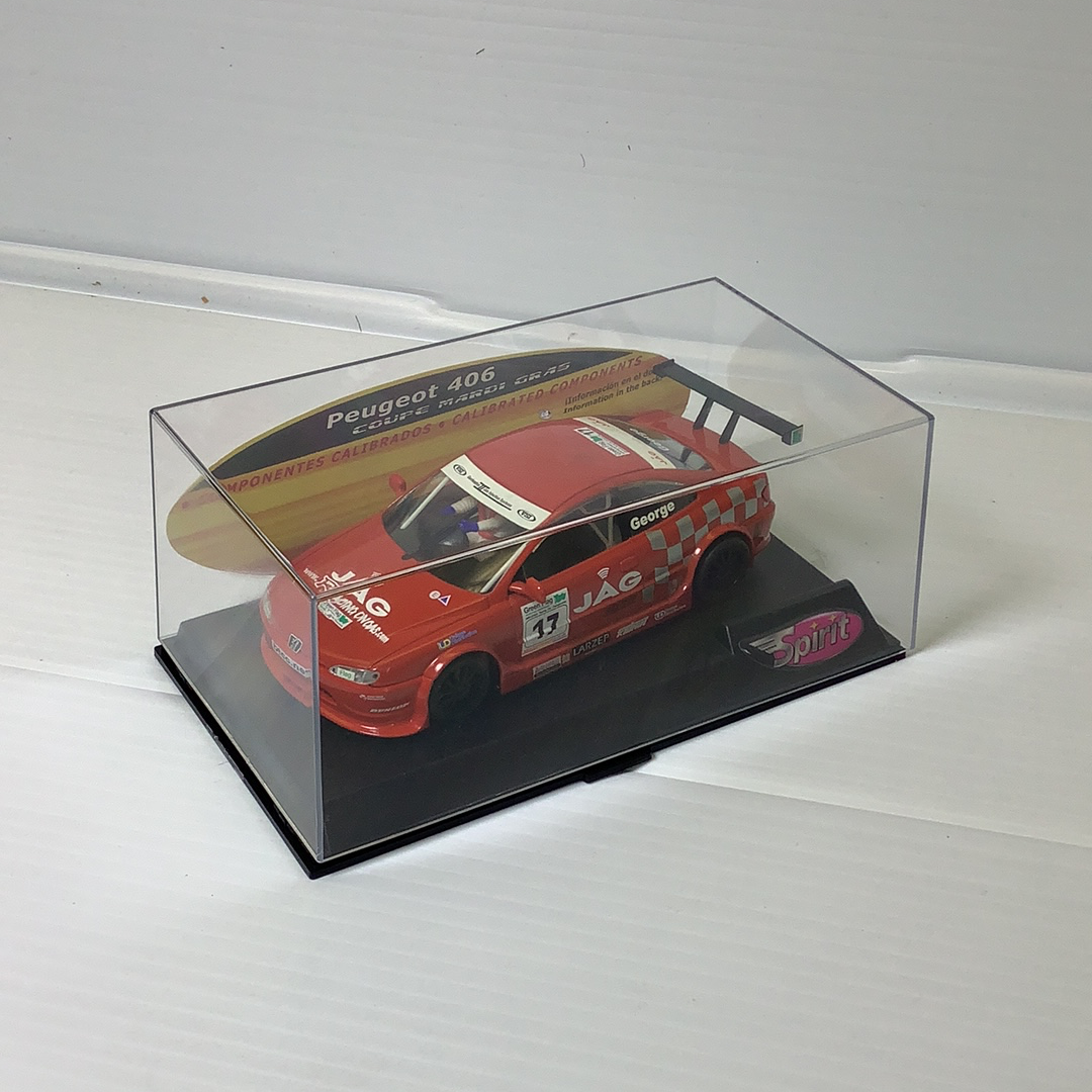 Red Peugeot 406 slot car in clear display case for SPIRIT 0501102