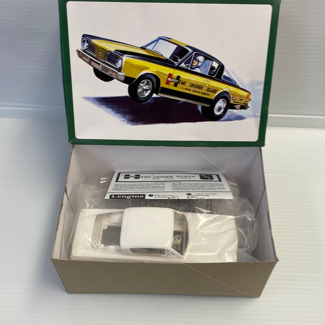 Yellow and black drag car model in its open box packaging for AMT AMT1153