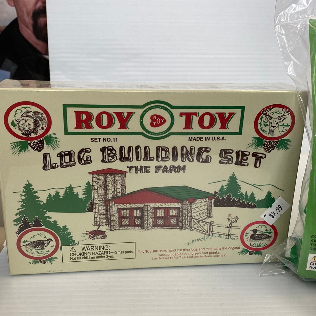 Toy box for a log building set, featuring a cabin design for Schylling
