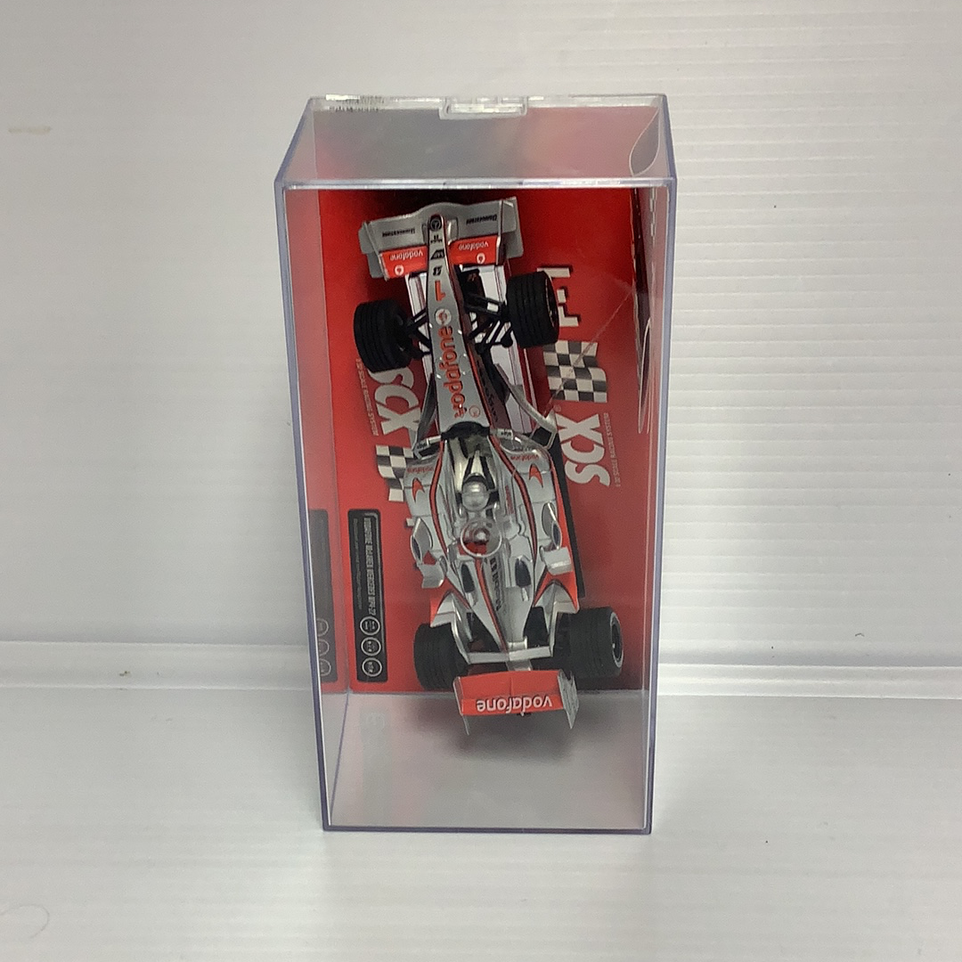 McLaren Mercedes MP4-22 slot car in its display box for SCX 62570