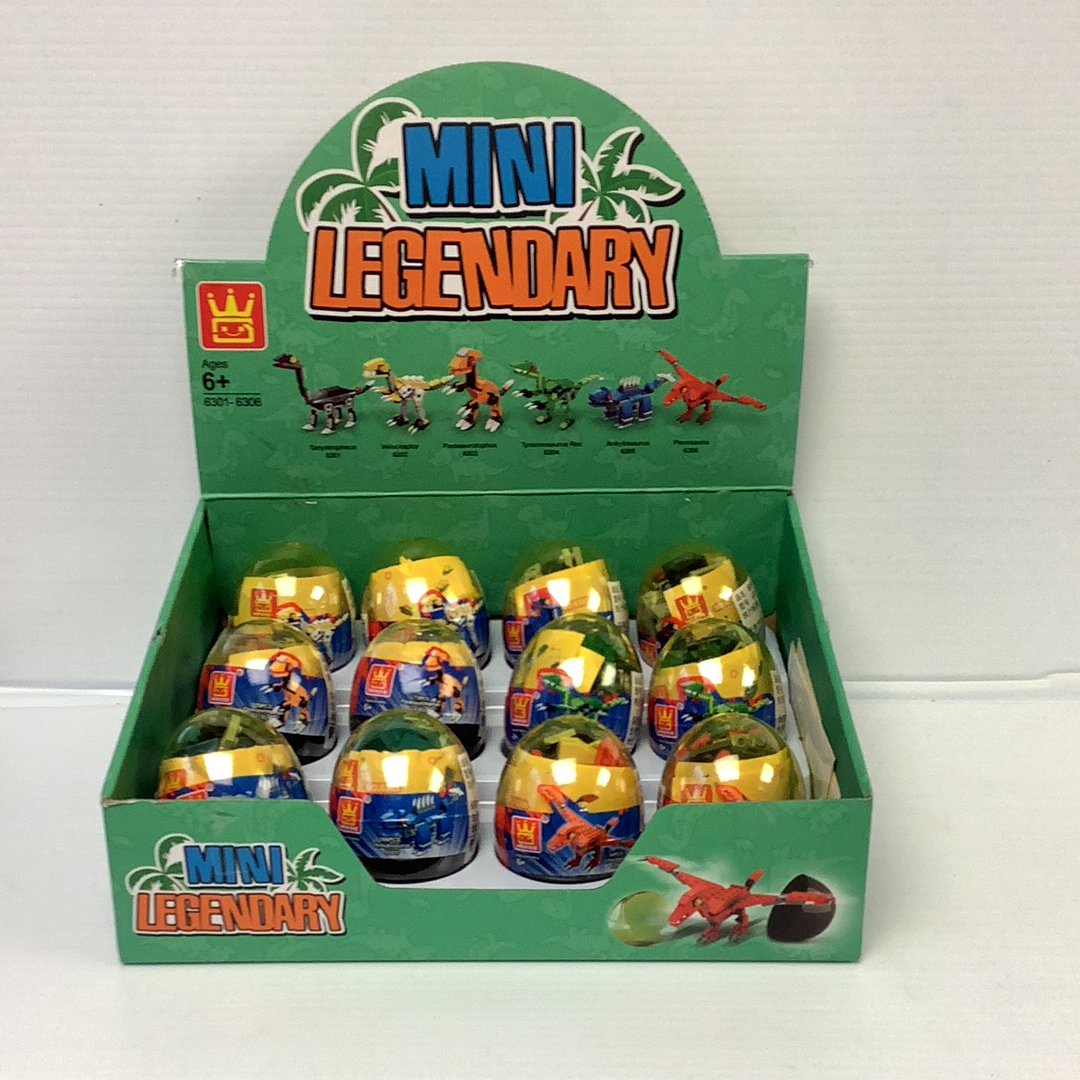Assortment of dinosaur egg toys in a green cardboard box for IMEX Model Company WAG63016