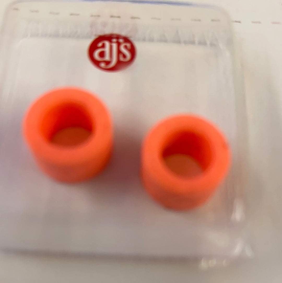 Two orange silicone tire fittings in clear packaging for AJ's 002