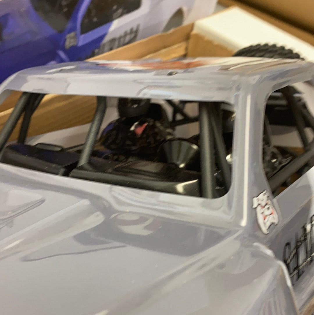 Gray scale model car interior view, showing seats and roll cage for IMEX 22010