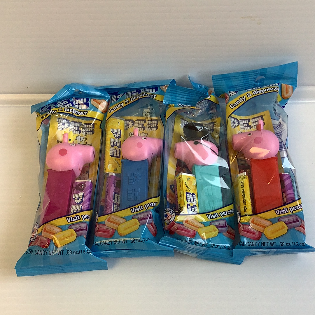Assortment of Peppa Pig themed candy dispensers in colorful packaging for Nassau Candy 41721