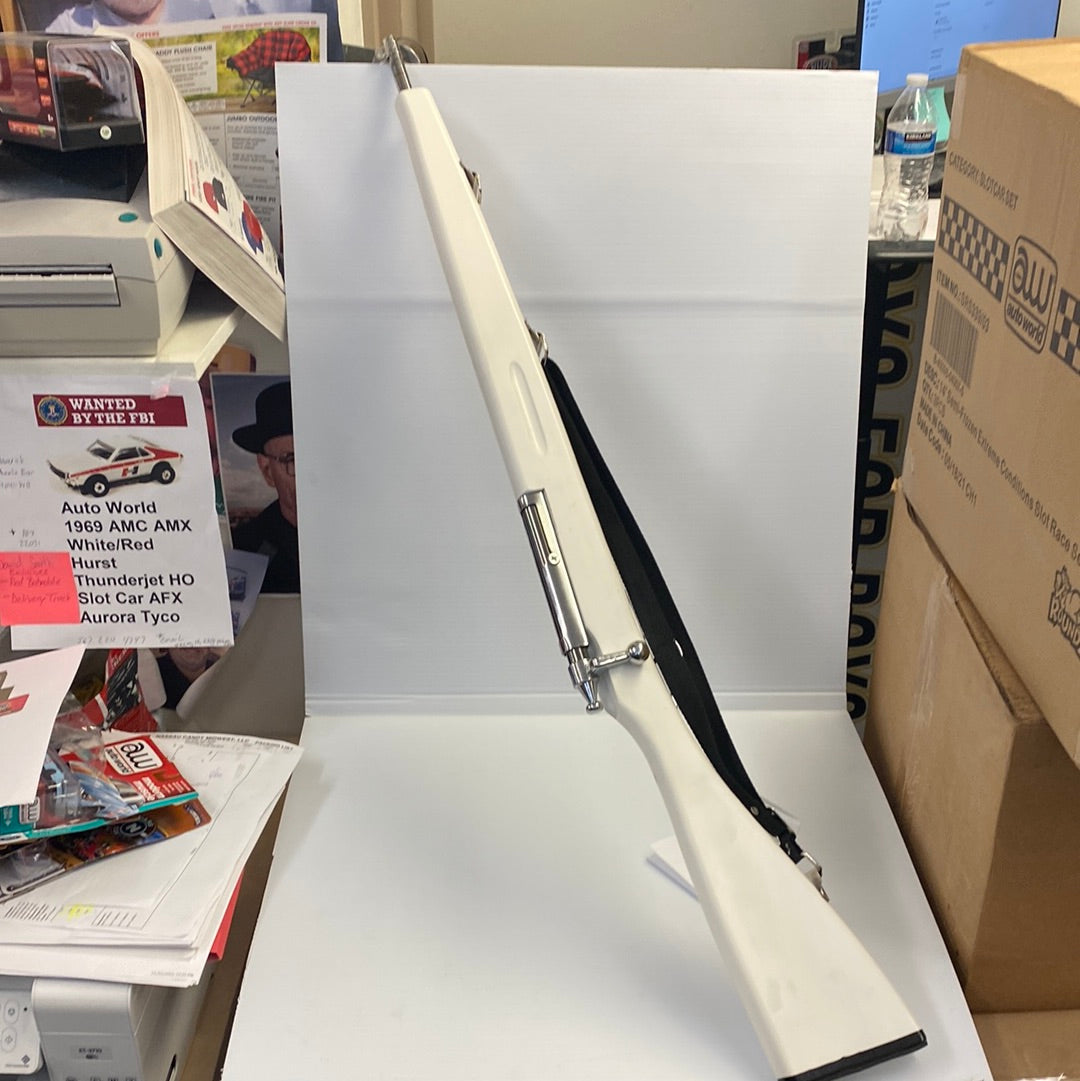 White trainer rifle with black sling, displayed on a white surface for Parris Toys M-30b Trainer Rifle