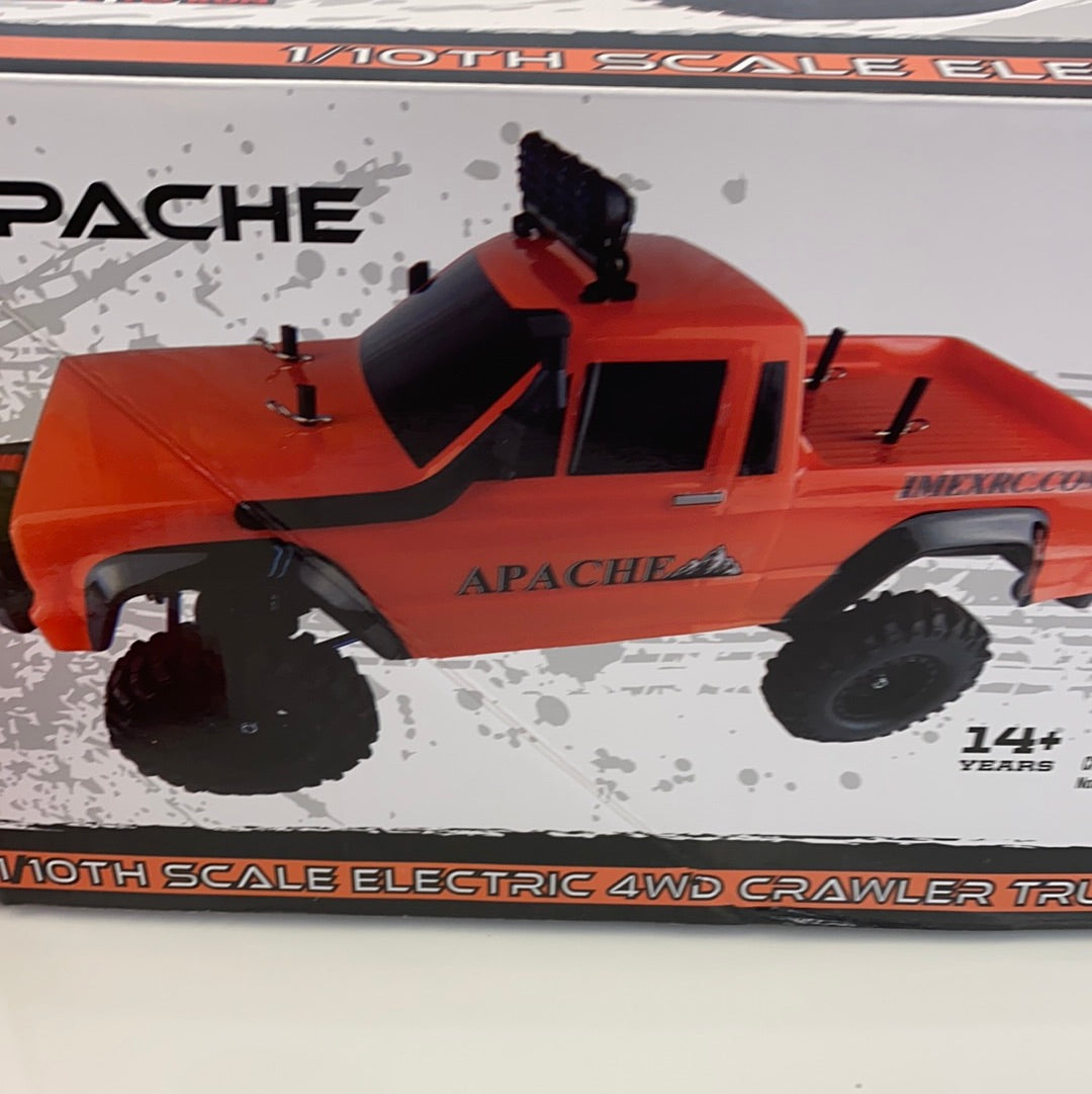 Orange 1/10th scale electric 4WD crawler truck on its box for IMEX 22020
