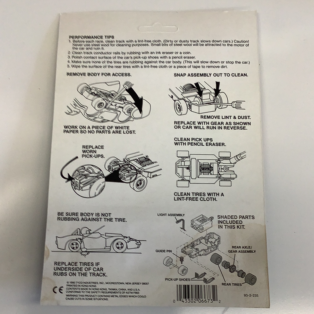 Instructions for tune-up kit use, showing parts and cleaning steps for Tyco 6673