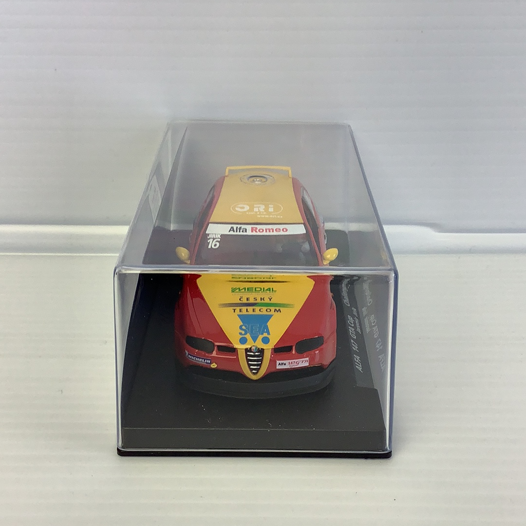Red Alfa Romeo slot car in its original display box for Fly Car 88197