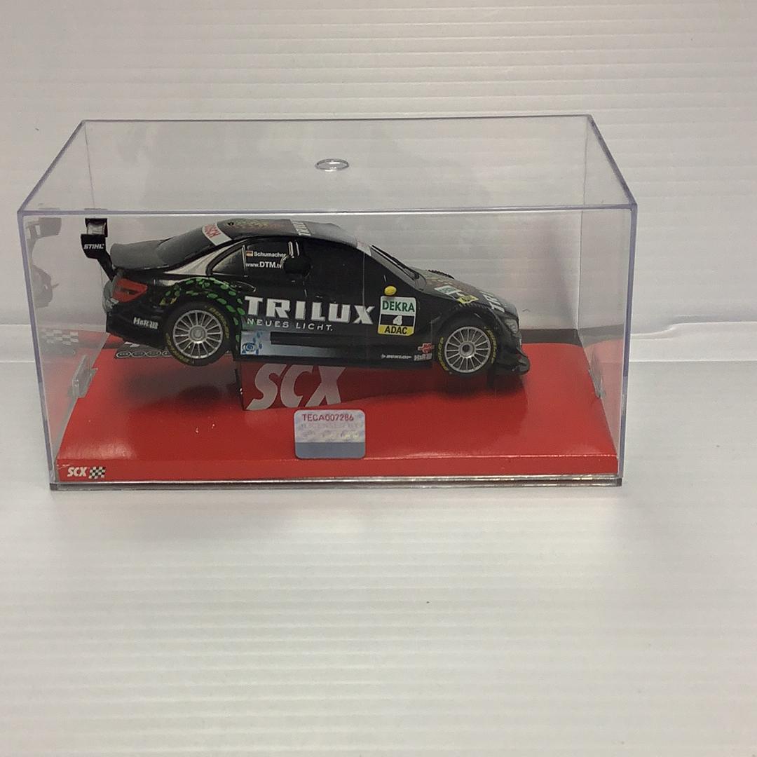 Black Mercedes C-Klasse race car model in clear display case for SCX A10142X3U0