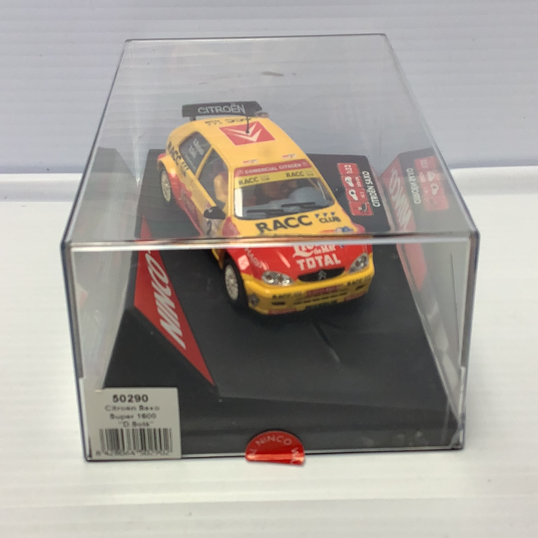 Slot car of a yellow Citroen Saxo race car for Ninco 50290, front view