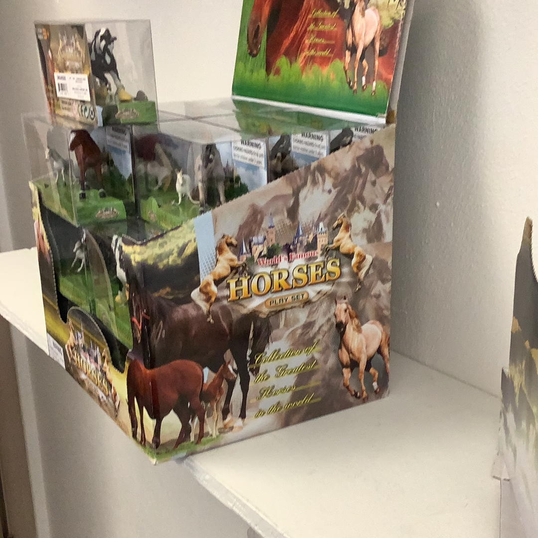 Toy set featuring collectible horses in a grassy outdoor scene for Schylling IMX49565