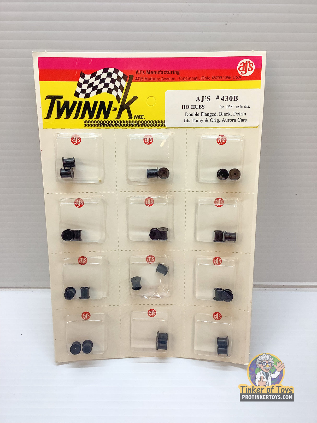 Assortment of black and silver model train hubs for .063" axles for HO Hubs for .063" axle dia 430B