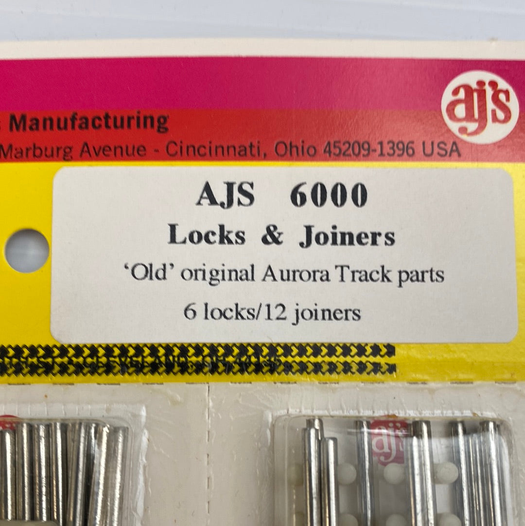 Assortment of silver slot car track locks and joiners for AJ'S Slot Car Parts 6000