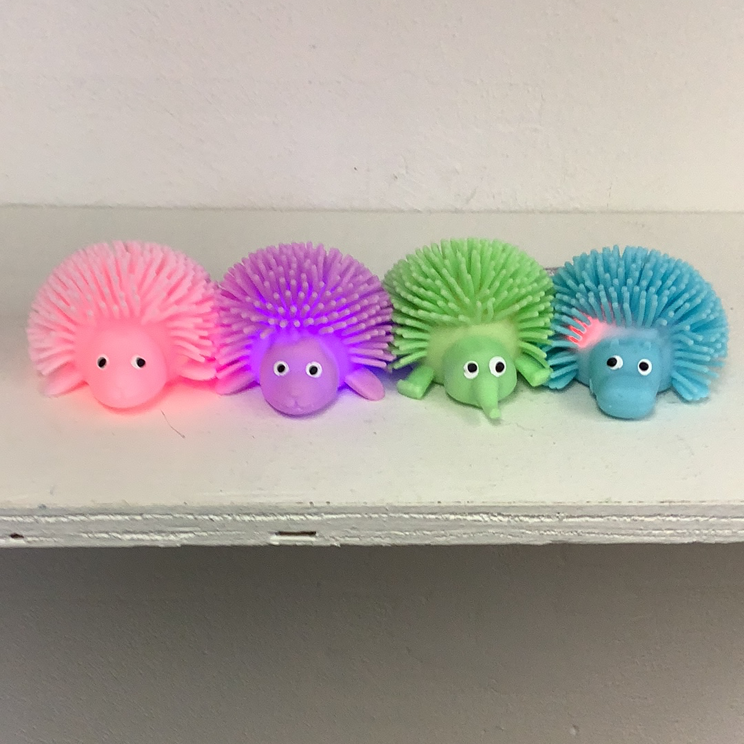 Colorful, soft hedgehog squeeze balls in pink, purple, green, and blue for IMEX-Toys 88323BA, rear view