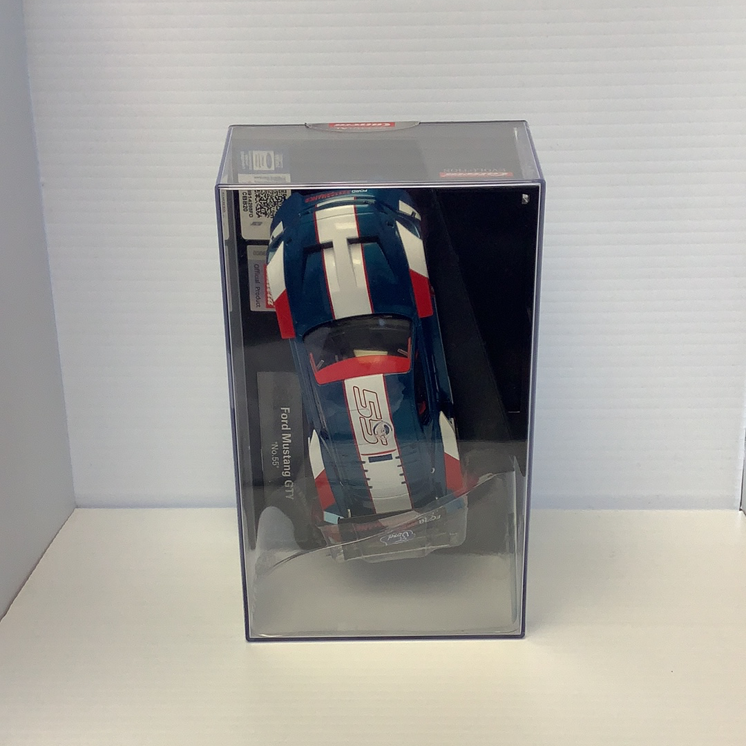 Blue and white Ford Mustang slot car in its original box for Carrera Evolution 27637