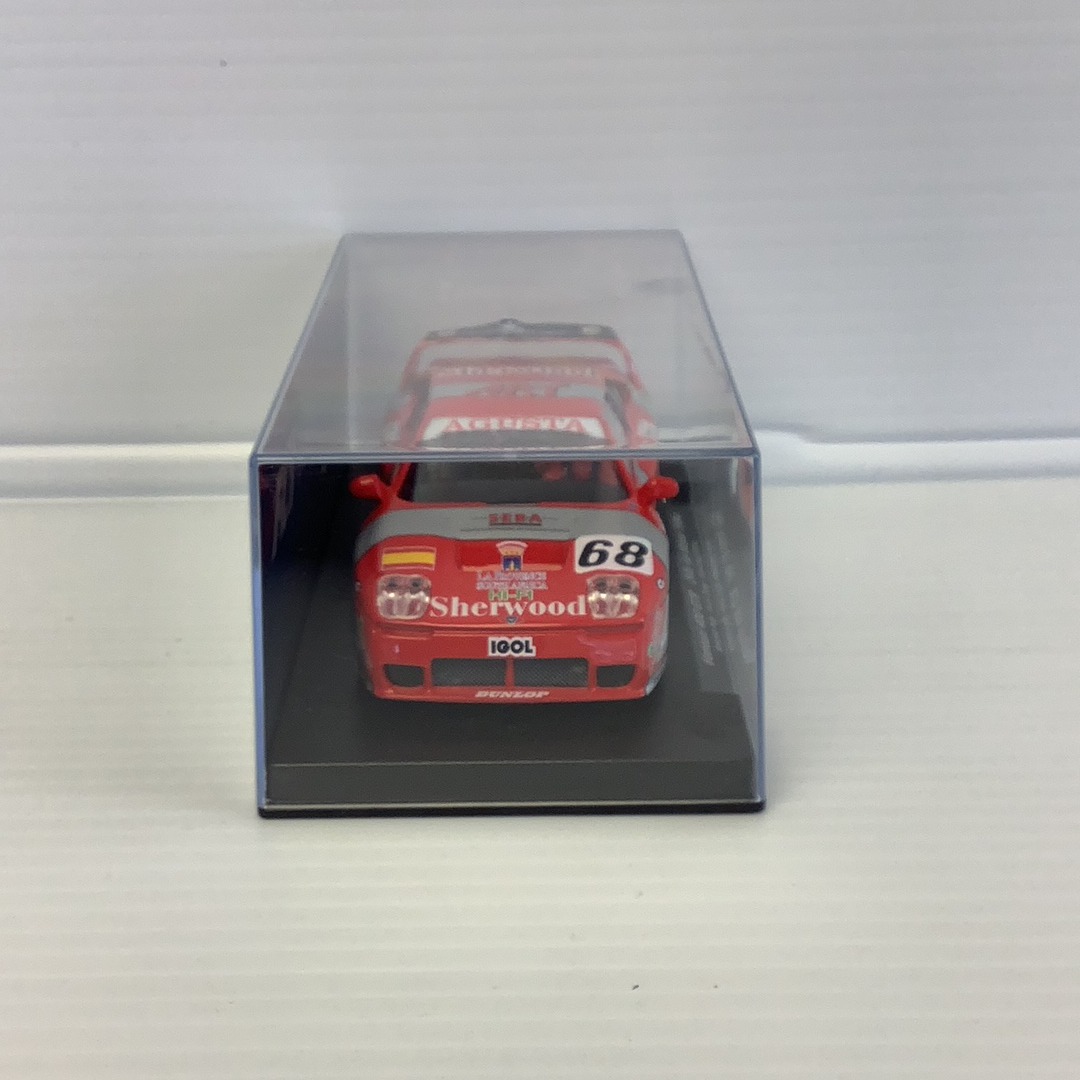 Red race car model in clear display box, 1994 Le Mans GTR for Fly Car 88272
