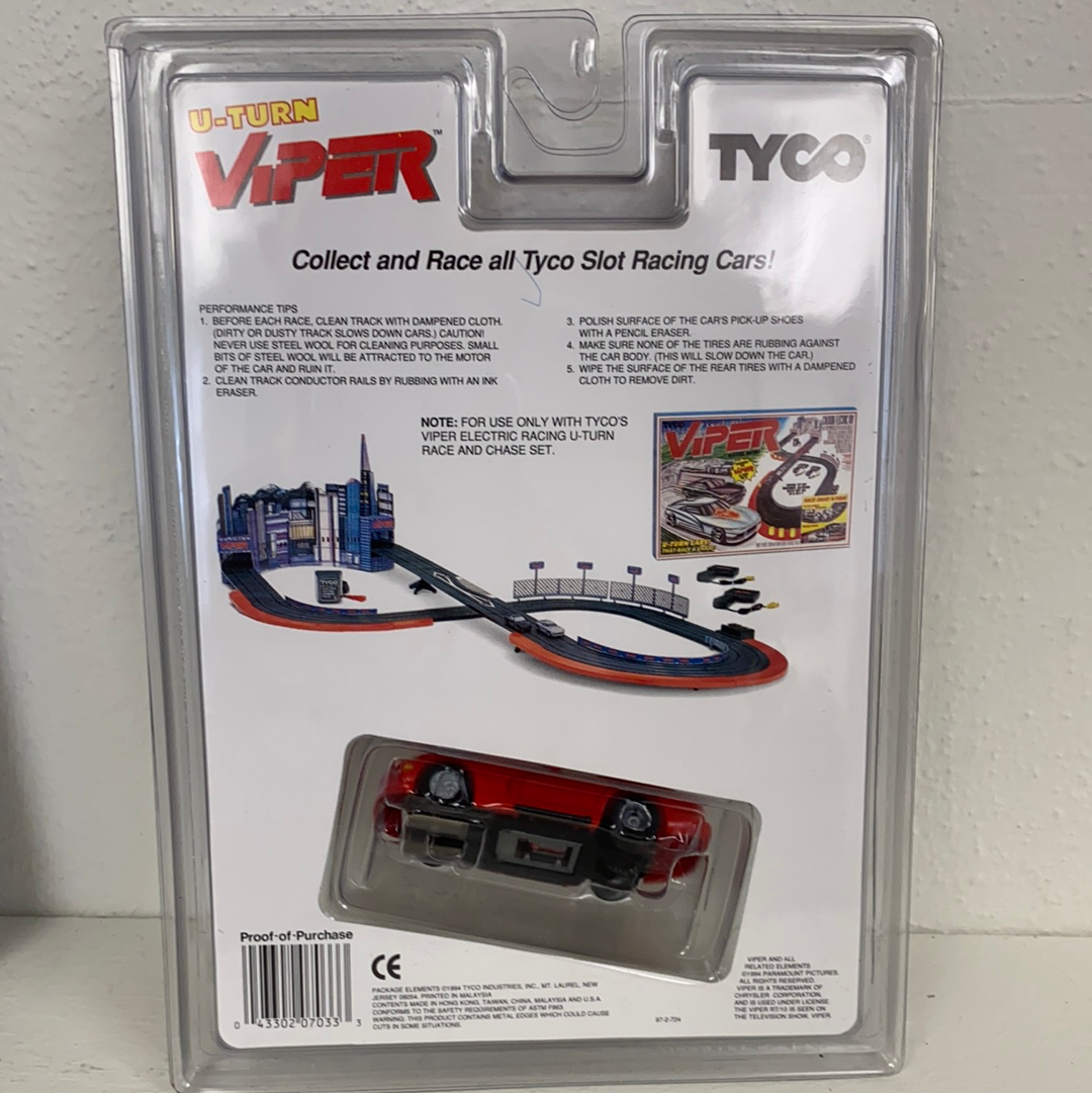 Red remote-control race car and track set for play for Tyco 7033