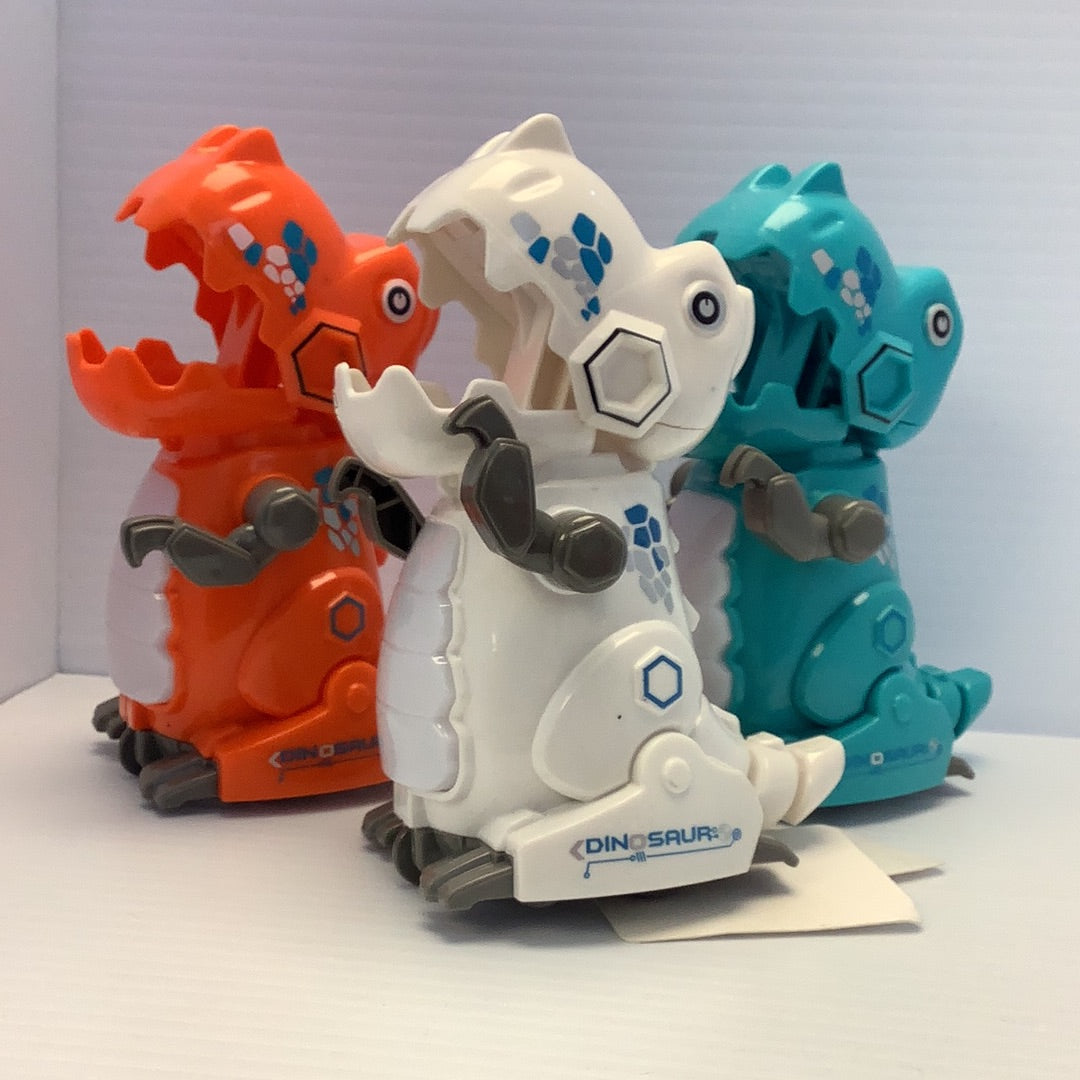 Three colorful, toy dinosaur figures standing together for BVP 88508