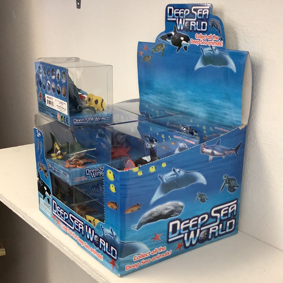 Toy display featuring deep-sea animal figures and packaging for IMEX-Toys IMX49572