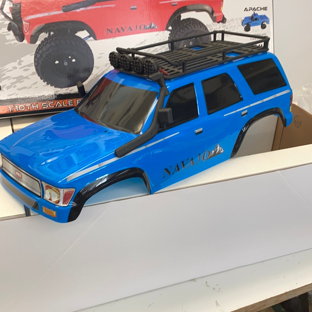 Blue 1/10th scale SUV crawler with roof rack and off-road tires for IMEX 22020
