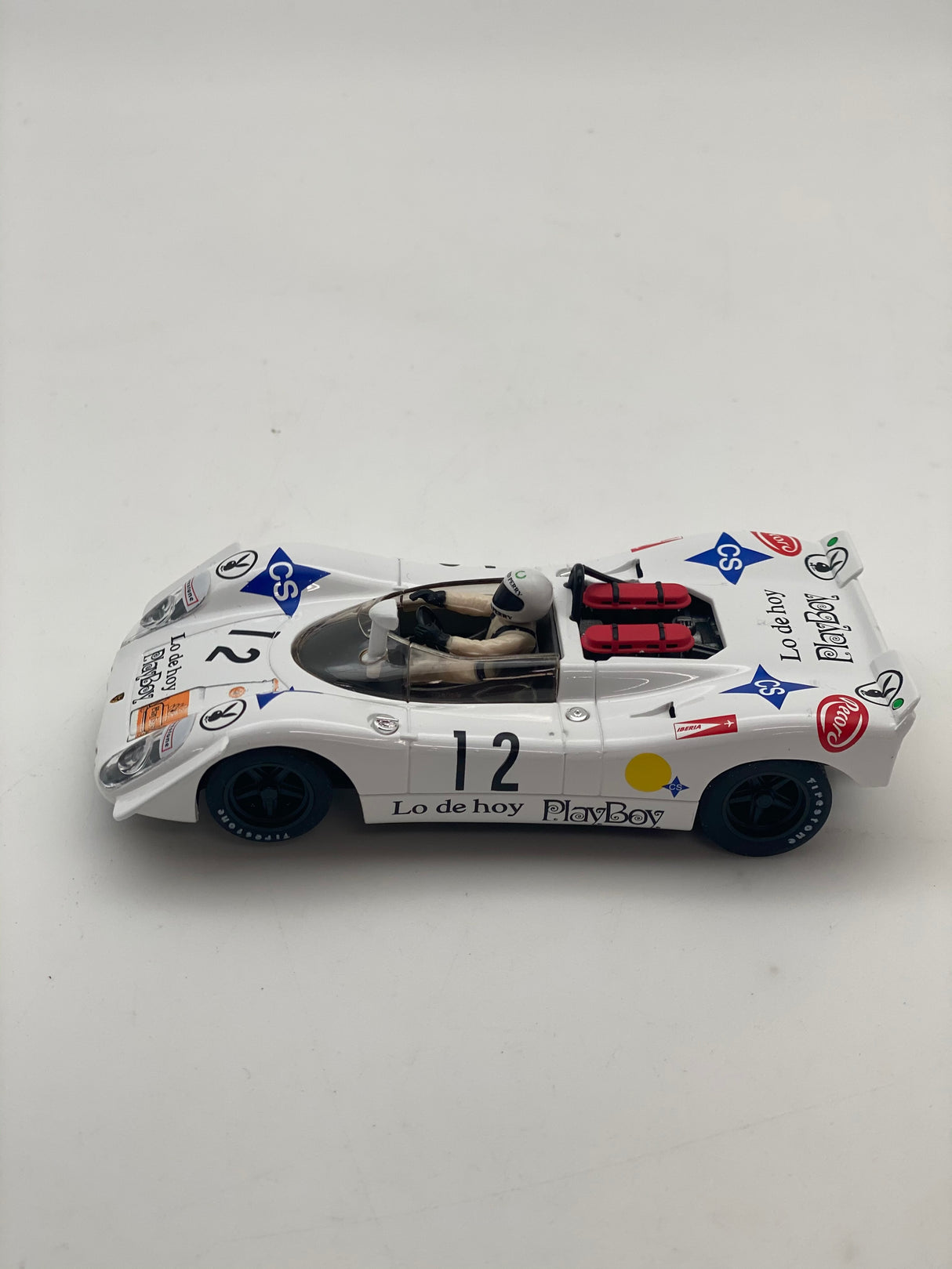 White race car model, Porsche 908/2, with "Lo de hoy PlayBoy" livery for Fly Car 88248, rear view