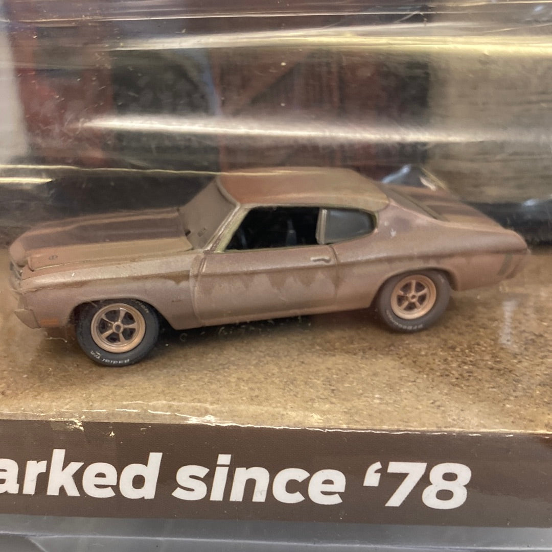Brown die-cast model of a 1970s Chevy Chevelle SS muscle car for Johnny Lightning JLDR004BN