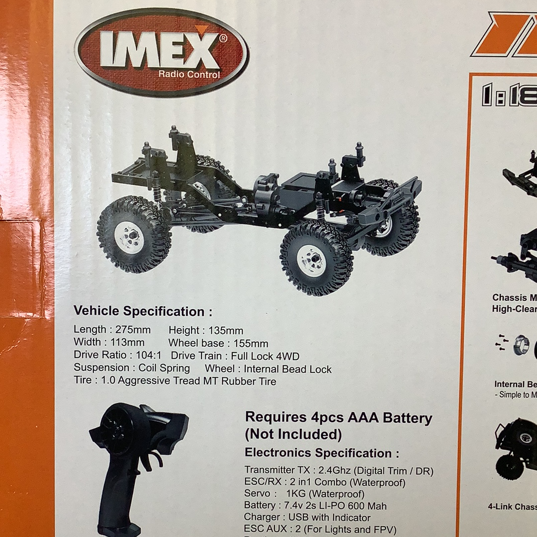 Remote-controlled crawler vehicle with large off-road tires and black chassis for IMX IMX25015