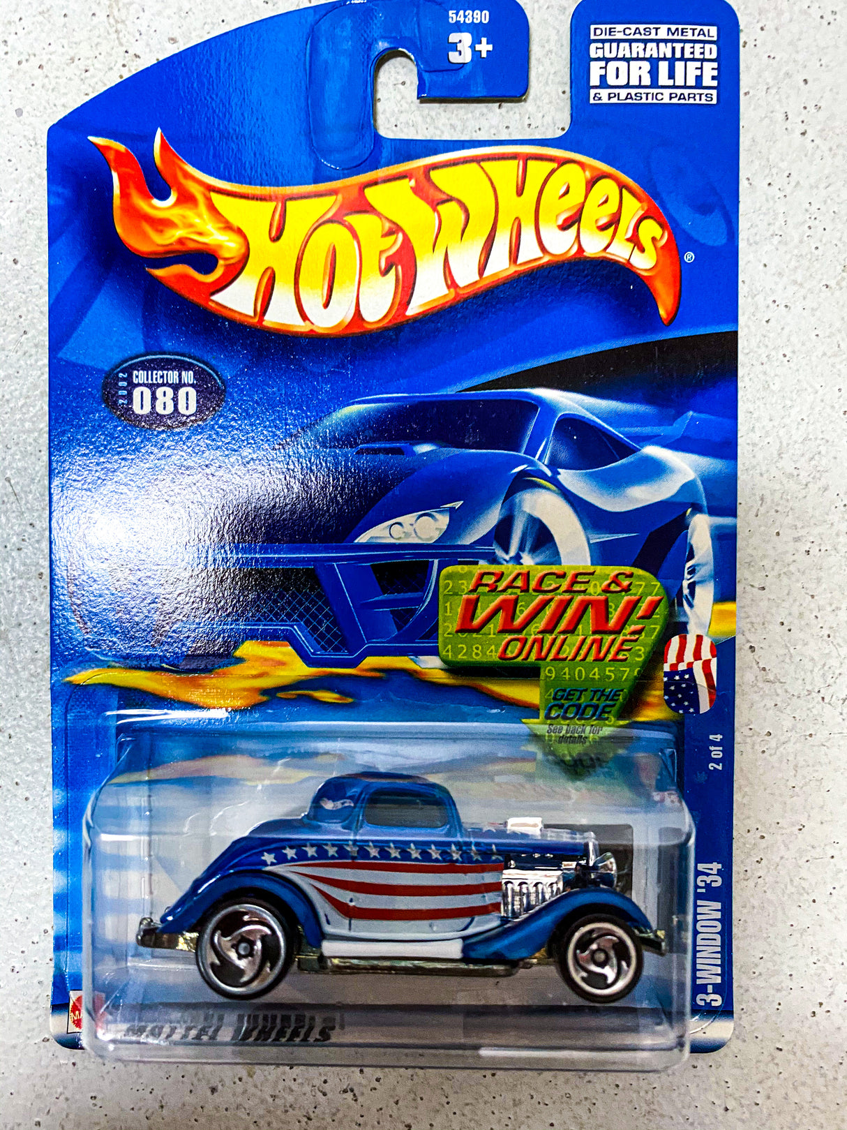 Blue 1934 hot rod die-cast toy car in blister packaging for Hot Wheels 080