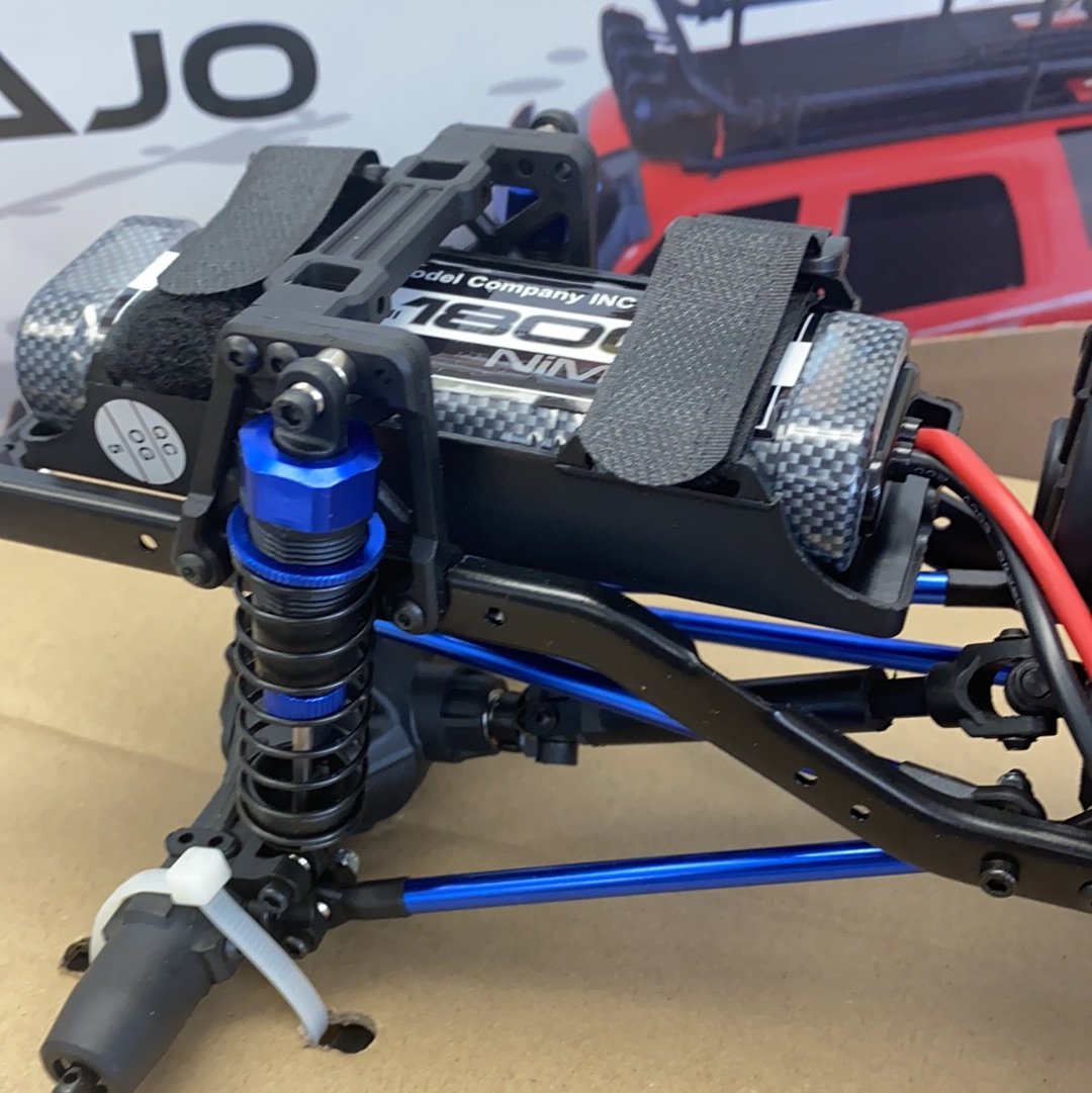 Crawler truck chassis with blue suspension components and black body panels for IMEX 22025