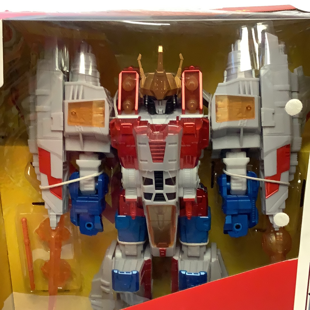 Three Transformers figures: Starscream, and two other robots, displayed in packaging for RJCollection