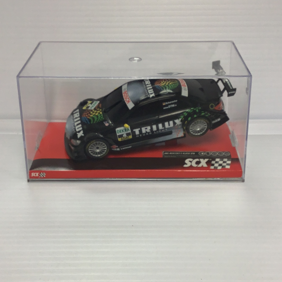 Black Mercedes C-Class race car model in clear display box for SCX A10142X3U0