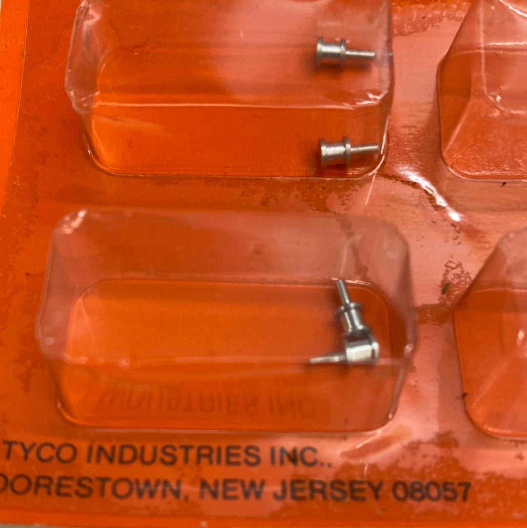 Assortment of guide pins for Magnum 440, organized in plastic trays for Tyco 6549