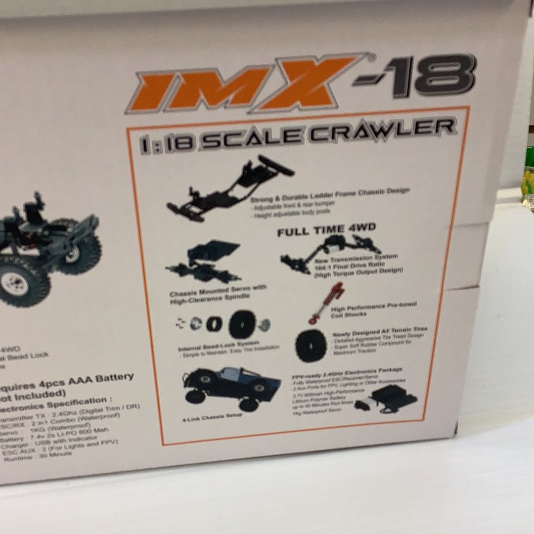 Crawler toy box art showing features and scale details for IMX IMX25000