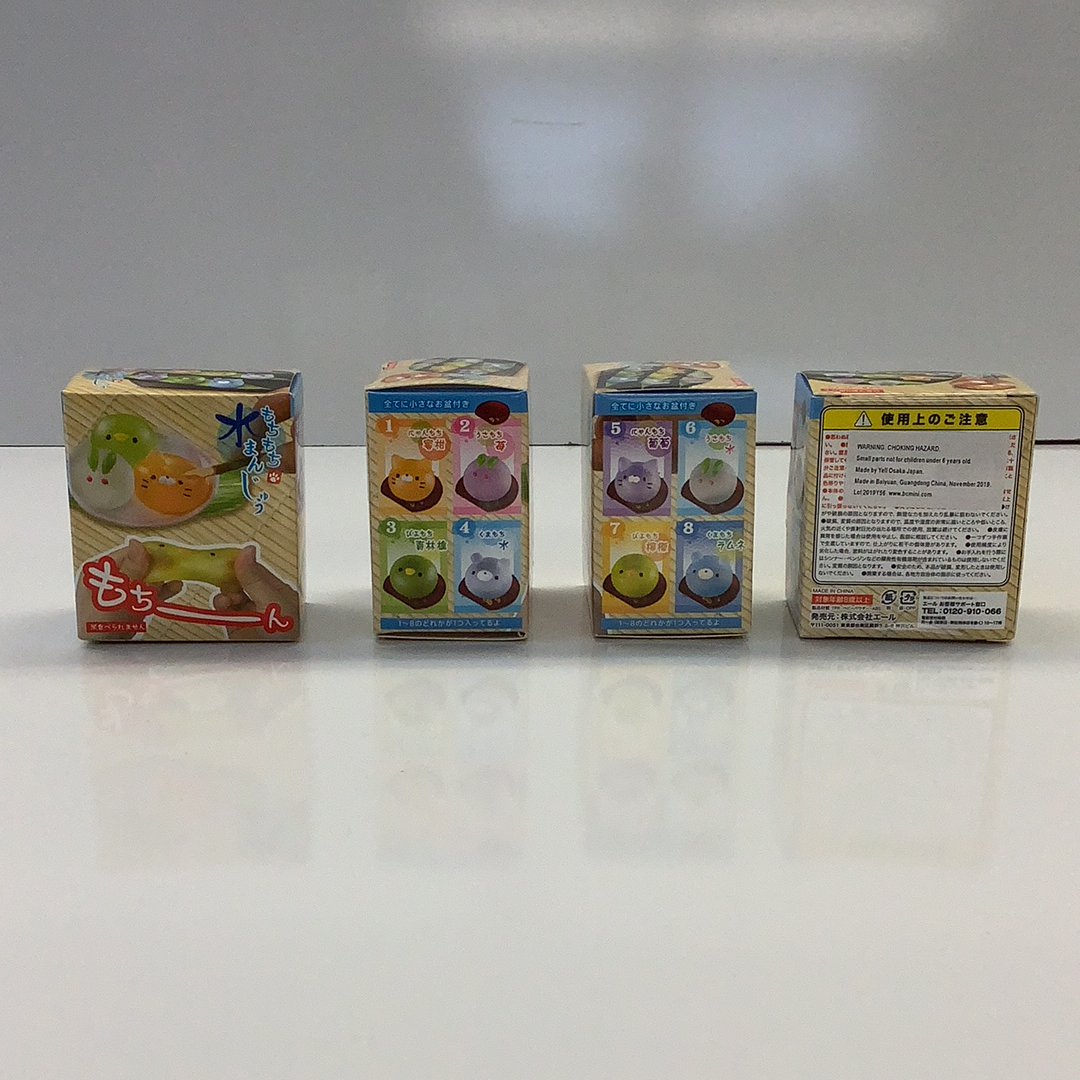 Assortment of gummy animal squishy candies in various packaging for BC USA 62222