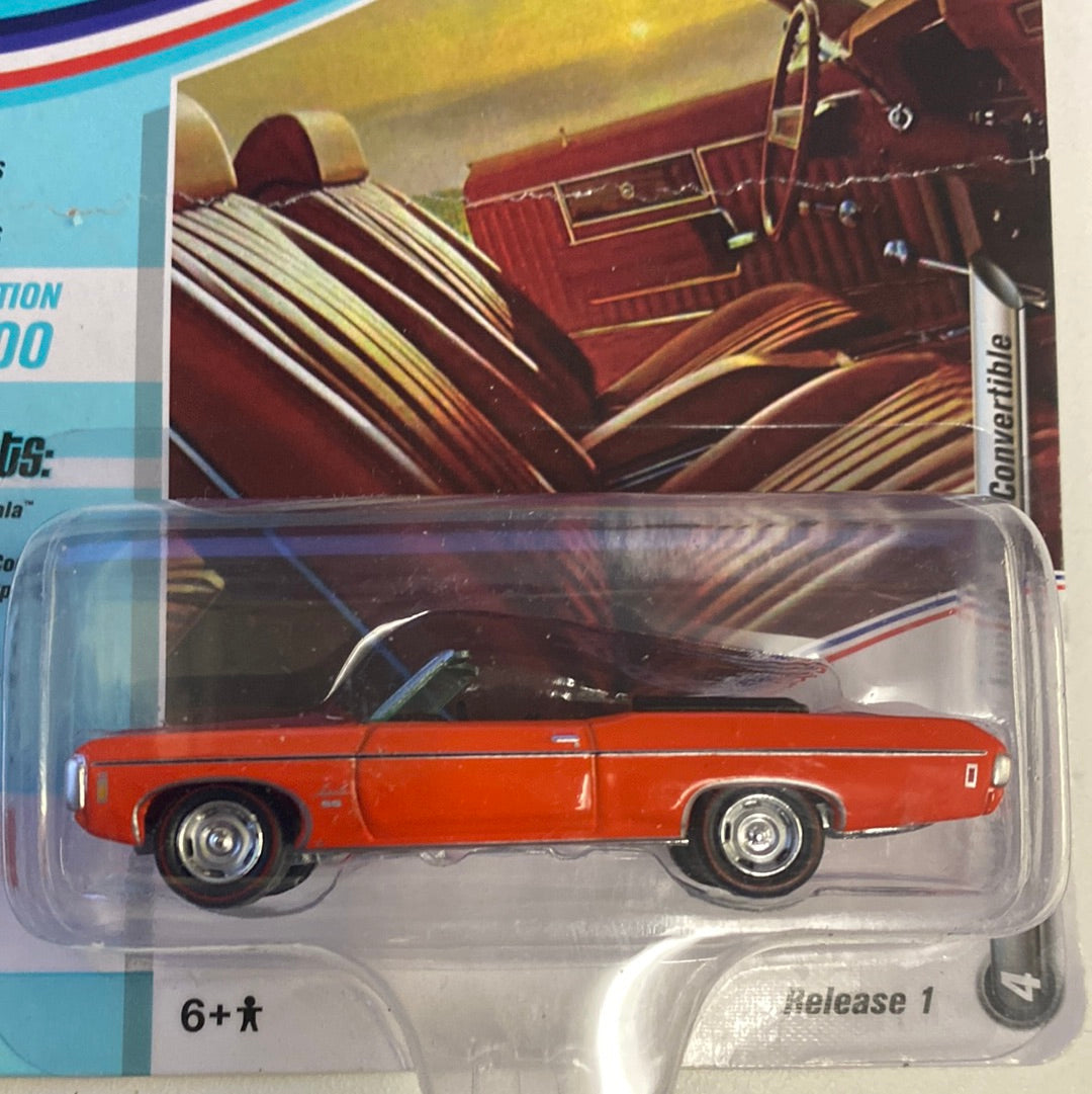 Red classic car toy in clear plastic blister packaging for Defectives Johnnny Lighting JLMC022