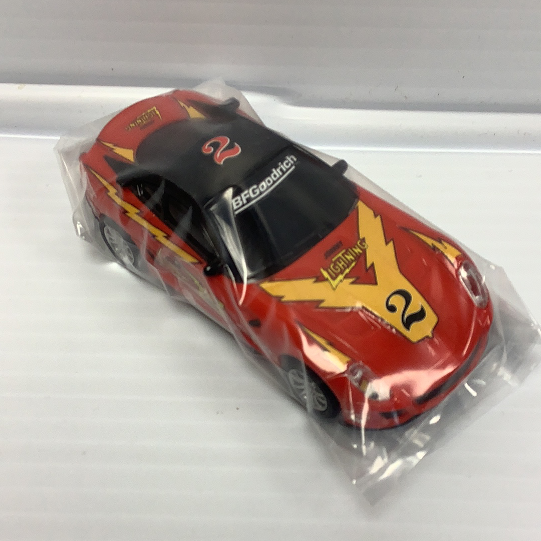 Red slot car with BFGoodrich and Lightning decals for Johnny Lighting JL2010