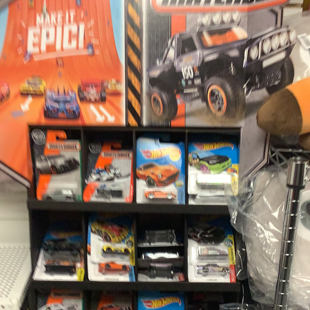 Assortment of die-cast toy cars and trucks in various colors and models for UPD 30782